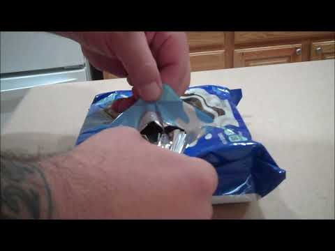 Opening a package of Oreo cookies