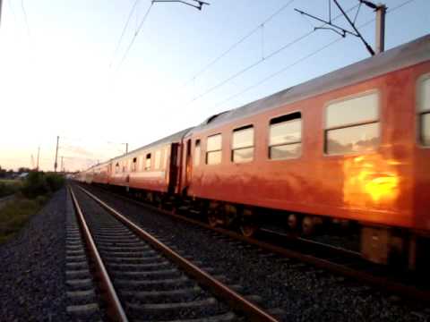 ROMANIAN CLASS 41-0242-2  PASSING AT SUNSET THROUGH BUFTEA