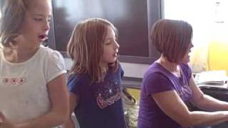 Emily Ann and Lily Patterfeet singing Hallelujah Praise The Lamb