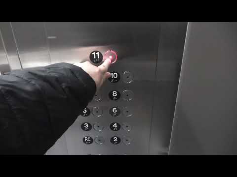 Tastefully Modernized Otis Autotronic Traction Elevators at 1980 Sherbrooke Ouest in Montreal, QC