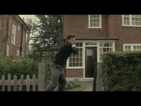 Trailer frame — end-of-film hush before end credits; bells suggest the Lennon track to follow