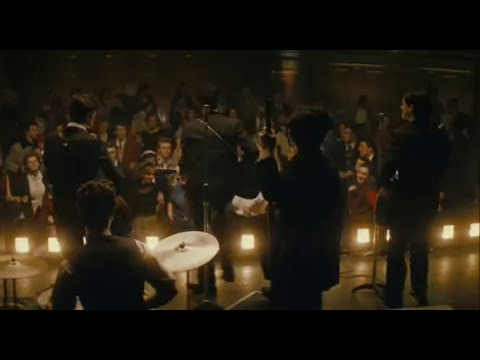 Trailer montage — quarry fields, bus tops, café jukeboxes timed to 50s needle-drops