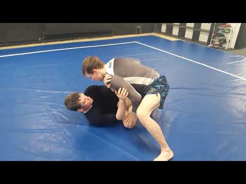 Guard Passing: Using your free leg to assist (Staple pass variation) // Tom Halpin