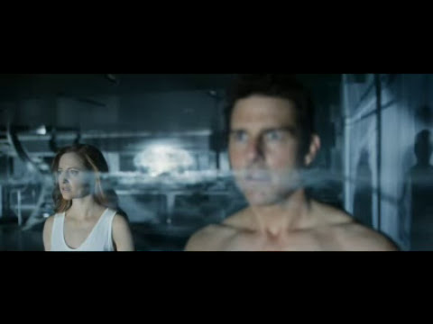 Oblivion 2013 official trailer still with Jack Harper walking across ruined Earth