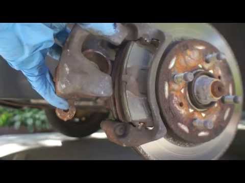 How to Replace Rotor and Brake Pads on a 2004 Mitsubishi Lancer ES