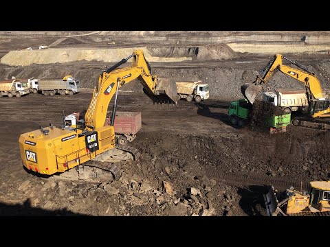 Caterpillar 6015B Excavator Loading Mercedes & MAN Trucks - Sotiriadis Mining Works