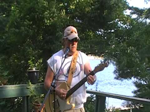 Paul Rogers sings Deb Ylanko's lyrics and plays his music for  the Bala Falls song.MOD