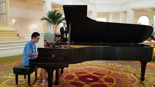 Julian is playing Prologue from Beauty and The Beast at Grand Floridian in Disney World