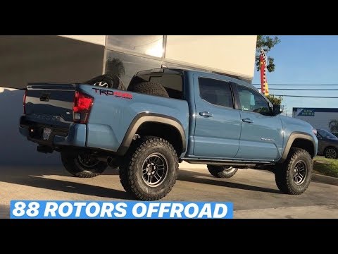 Cavalry Blue Tacoma On Fox Suspension & Enkei RPT1