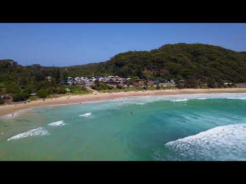 Aerial footage of Seal Rocks and its sands 