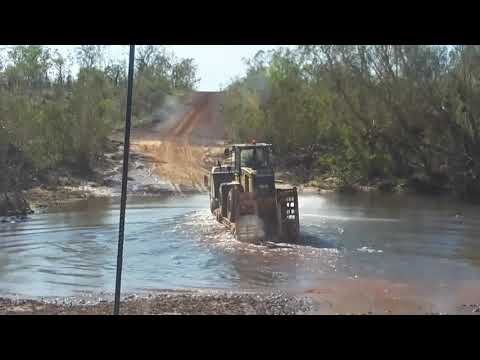 Australia River-crossing Roadtrain Mercedes Benz + CAT loader Northern Territory