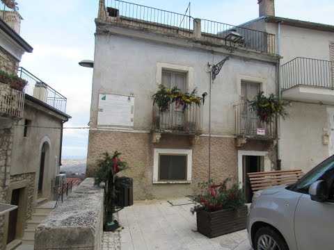 For sale, historic, stone property in the old part of town with amazing sun terrace.