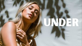 Musik-Video-Miniaturansicht zu Under Songtext von Ashley Cooke