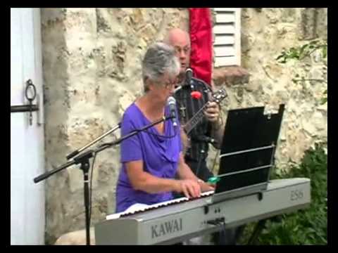 Eileen playing Button Up Your Overcoat, with her husband Alan on Ukalele