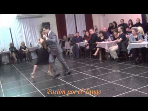  Stella Missé  and  Diego Mohammad  are  dancing  to  the  milonga  "  Mozo Guapo  "  by  Ricardo Tanturi