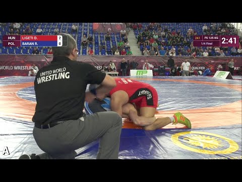 1/4 FS - 125 kg: D. LIGETI (HUN) df. R. BARAN (POL), 10-3
