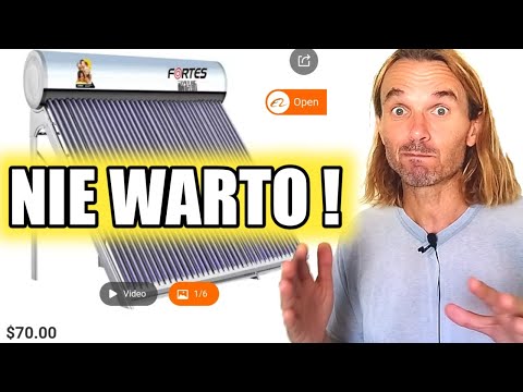 Don't buy solar panels. PV panels will heat water cheaper and light your home as a bonus.