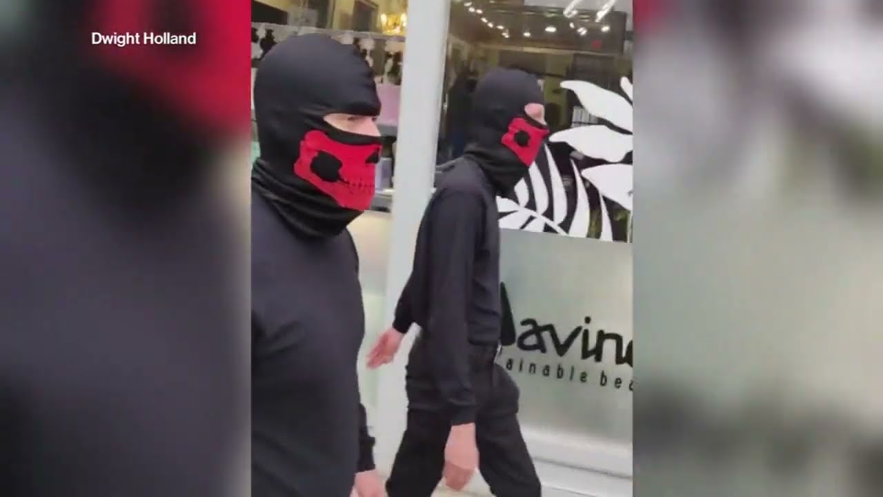 Masked group marches through Ohio neighborhood with swastika flags