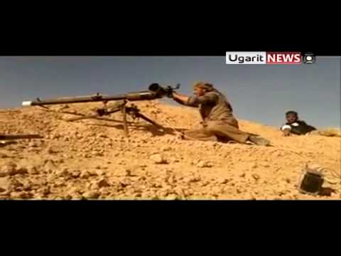 آلية مدمرة بعد استهدافها في مدينة الميادين في دير الزور