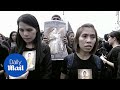 Thai people gather en masse to sing in memoriam to their late King - Daily Mail