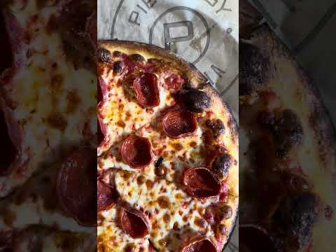 Pieology! Custom made pizza!🍕 This one topping, thin was $9.99! OK but not great.