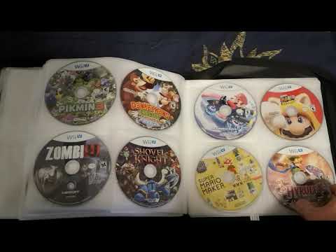 I put my ENTIRE video game collection in BINDERS!!!