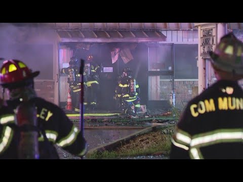 Firefighters tackle flames at Ferguson laundromat