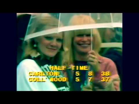 Covering up from the rain during the 1981 VFL grand final.