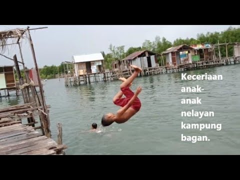 Batam - Joy of Children of Bagan Fisherman Village Swimming in the Sea