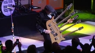 Fan  holds up &quot;Bun E Who?&quot; sign at Cheap Trick concert.