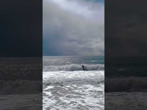 Stormy Surfs 🏄‍♂️🌊😳 #adventure #youtubeshorts #beach #travel #waves #life #surfing