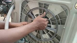 How to remove front load washing machine drum part.1