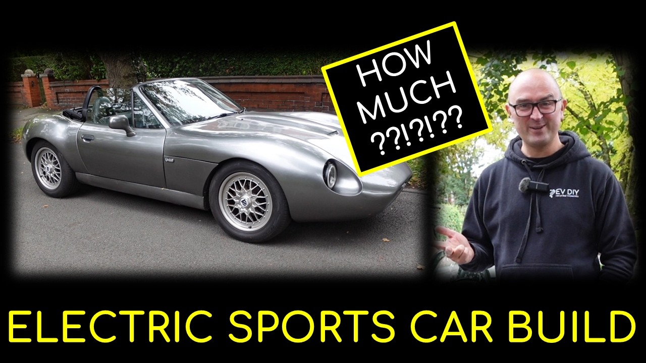 Blue converted electric roadster built from a BMW Z3 parked on a driveway