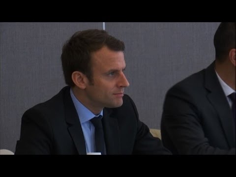 French frontrunner Macron visits factory in Le Pen country