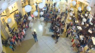 LET IT BE: Kids surprise mall shoppers with the beatles famous song