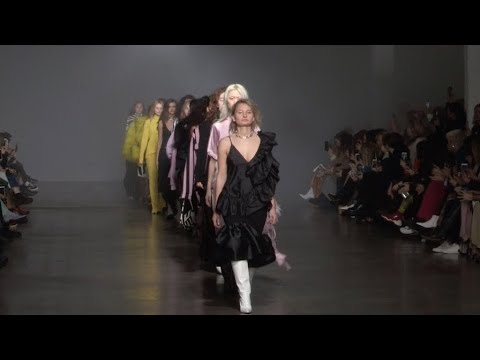 Models and designer on the runway for the Marques Almeida Fashion Show in London