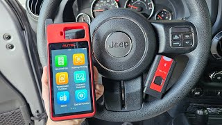 Jeep Wrangler key programming AUTEL KM100