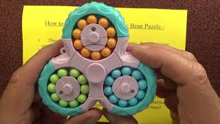 Download the video "How to Solve the Rotating Magic Bean Puzzle - Solving the 3 in 1 Puzzle - Step by Step Tutorial"