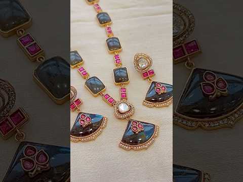 Brass dual tone peacock earcuff