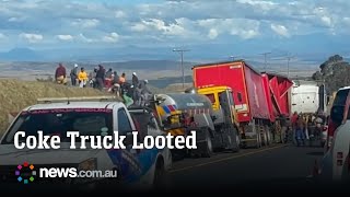 Coca-Cola truck looted after stopping on road in South Africa