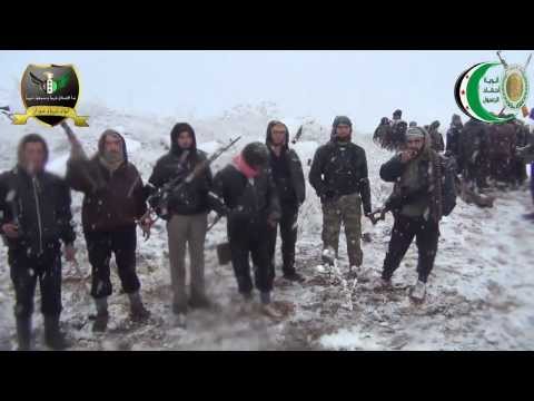 استعداد عناصر لواء غرباء حوران اقتحام حاجز معمل الكونسروة في محافظة درعا