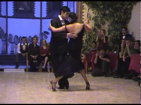  Maria Ines Bogado  and  Sebastian Jimenez  are  dancing  to  the  tango  "  Junto A Tu Corazon  "