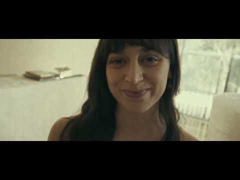Rest in Peace trailer frame showing a tense drive through Buenos Aires at night underscored by synth-pop