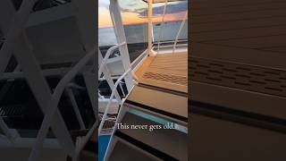 Climbing the stairs on MSC World Europa as the city slowly appears…