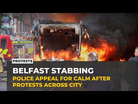 Protesters torch cars, buildings in Belfast after knife attack