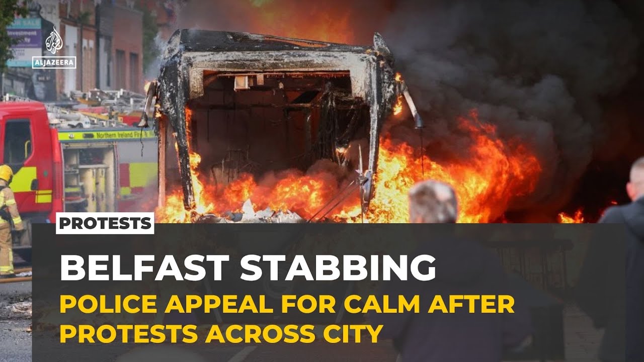 Protesters torch cars, buildings in Belfast after knife attack