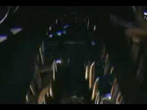 Robot T-Rex Tearing Through Car