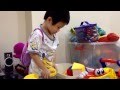 Owen Digging Treasure Chest With His Barney Backpack