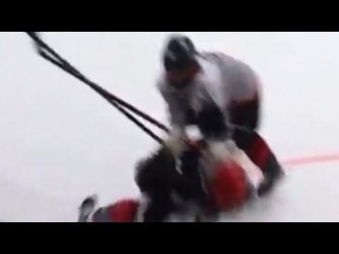 Open ice body check against Czech Knights. World Selects invitational Hockey Championship in Prague