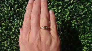 A three stone Diamond Cross Over ring